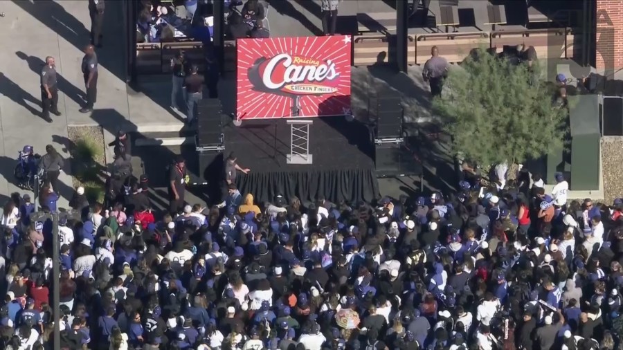 Dodgers fans gather to greet Kike Hernández at Raising Caine's in Alhambra.
