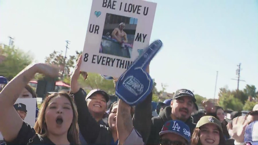 Dodgers fans gather to greet Kike Hernández at Raising Caine's in Alhambra.