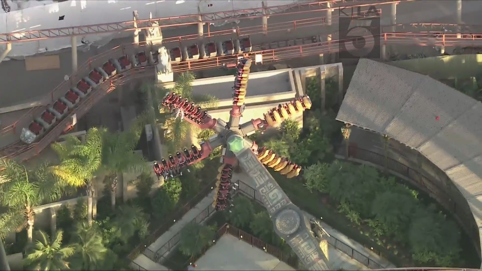 Stuck riders are seen suspended in air aboard the Sol Spin ride at Knott's Berry Farm on Nov. 18, 2024. (KTLA)