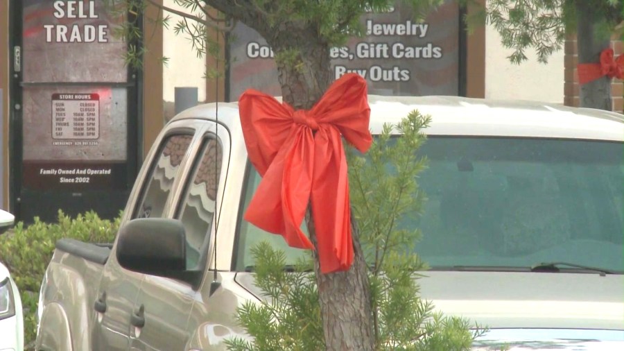 Ribbons were placed around the parking lot outside The Mill Restaurant to honor Adam Bouvet. (KTLA)