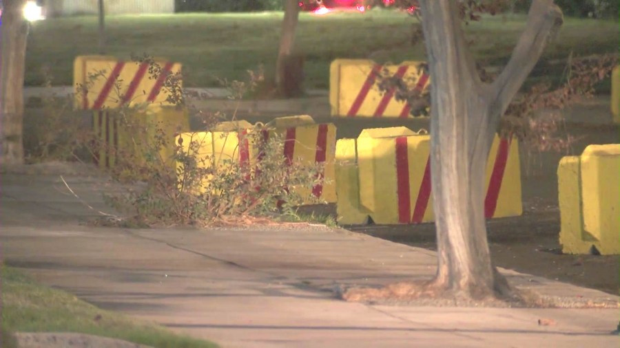 Heavy, brightly-colored concrete barriers have been inexplicably placed on streets across the West San Fernando Valley area in a possible attempt to prevent homeless encampments and long-term RV parking. (KTLA)