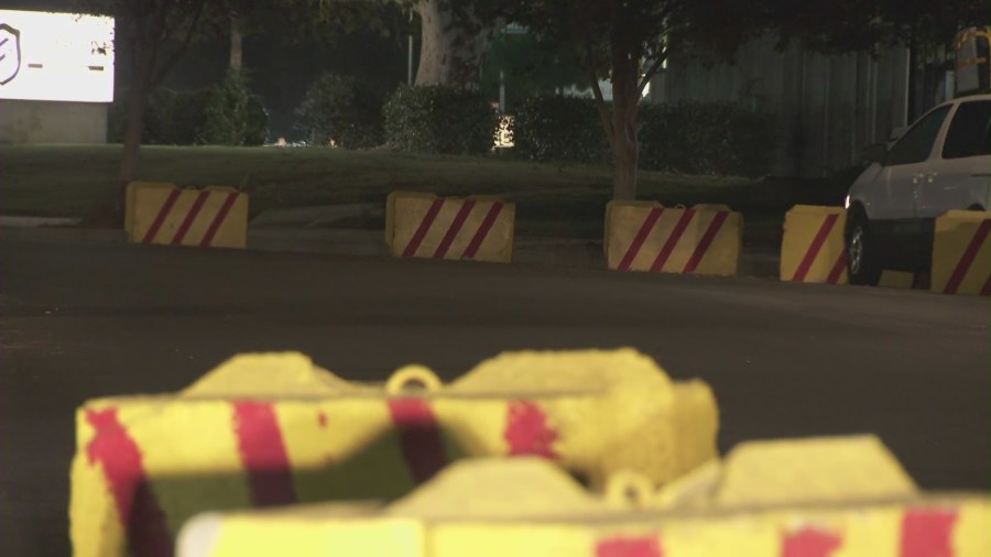 Heavy, brightly-colored concrete barriers have been inexplicably placed on streets across the West San Fernando Valley area in a possible attempt to prevent homeless encampments and long-term RV parking. (KTLA)