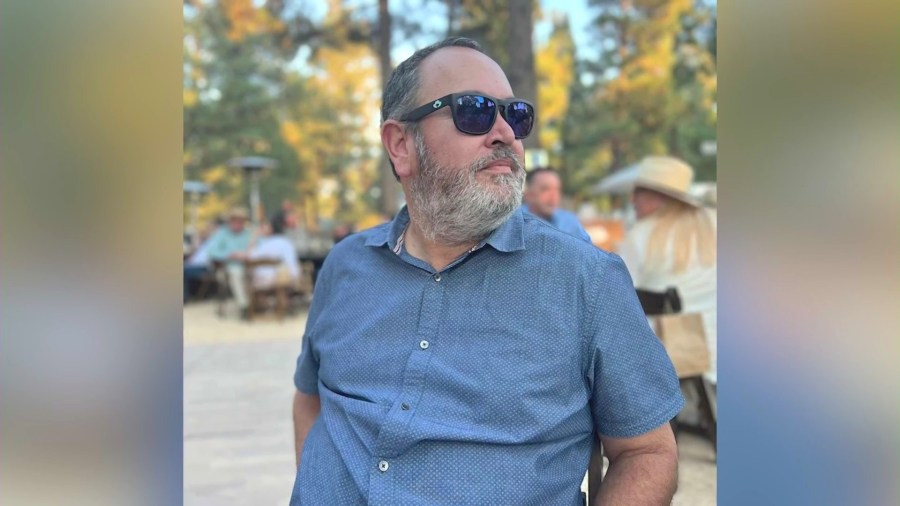 Adam Bouvet, 50, is seen in a family photo.