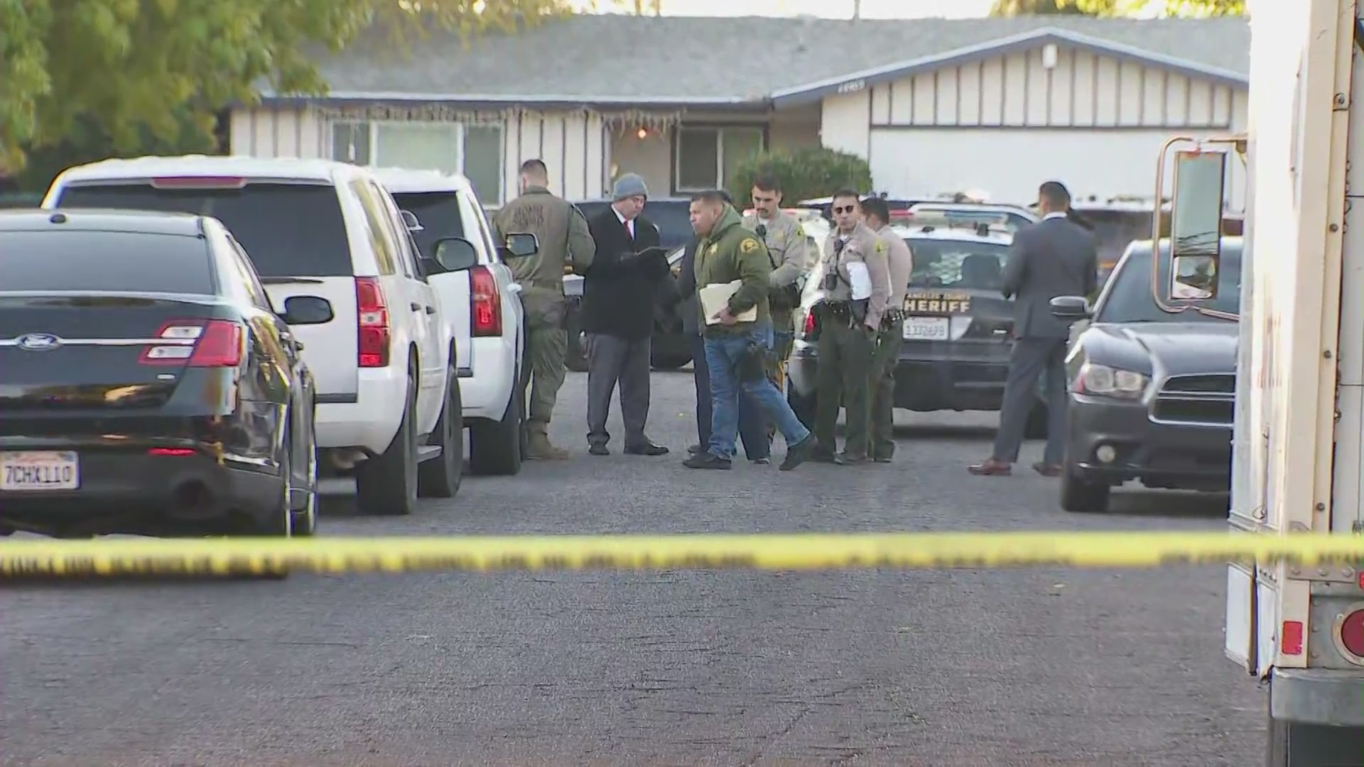 Detectives and L.A. County Fire Department arson investigators were seen combing the area for evidence at 7 a.m. Saturday. (KTLA)