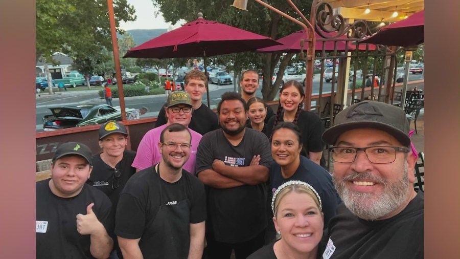Adam Bouvet is pictured with his restaurant team members. (Bouvet Family)