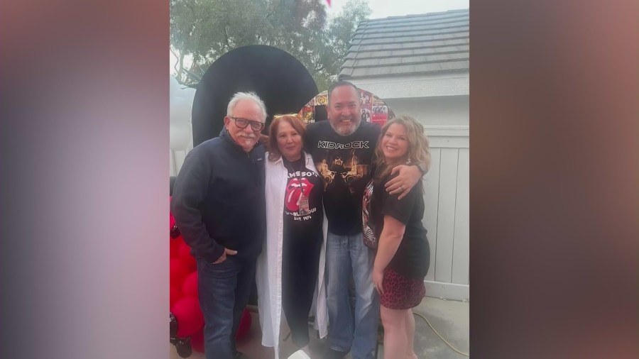 Adam Bouvet is seen with his wife and loved ones. (Bouvet Family)