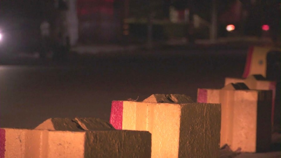 Heavy, brightly-colored concrete barriers have been inexplicably placed on streets across the West San Fernando Valley area in a possible attempt to prevent homeless encampments and long-term RV parking. (KTLA)
