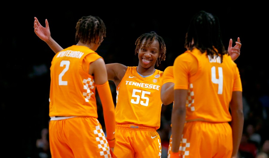 Tennessee's Ruby Whitehorn (2), Talaysia Cooper (55) and Kaniya Boyd (4) celebrate their win over Iowa in an NCAA college basketball game Saturday, Dec. 7, 2024, in New York. (AP Photo/John Munson)