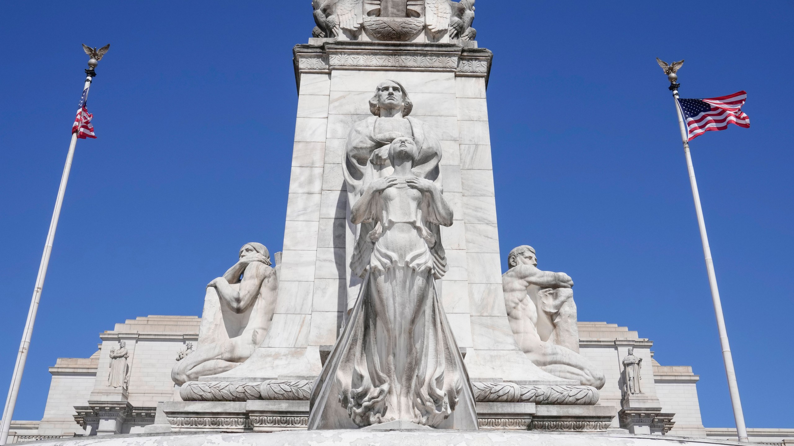FILE - American flags fly at Union Station, March 8, 2023, in Washington. (AP Photo/Mariam Zuhaib, File)
