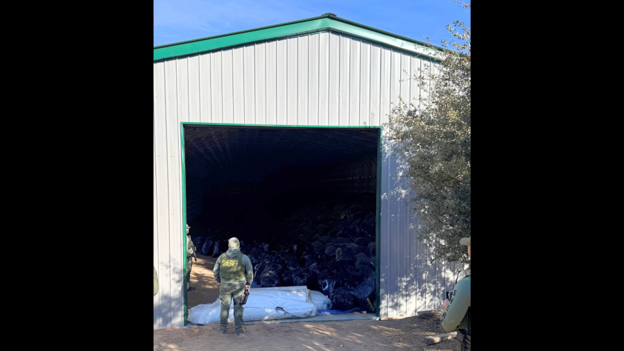 The metal stash house where over $100 million worth of suspected illegal marijuana was found in Oak Hills on Dec. 9, 2024. (KTLA)