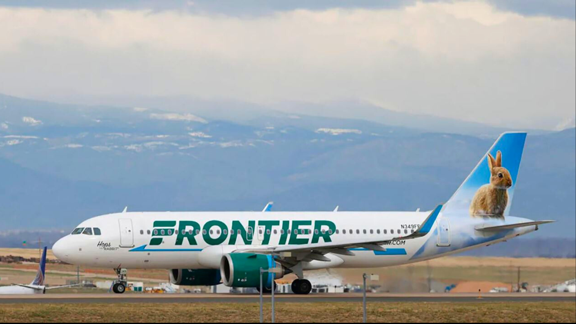 A Frontier Airlines jetliner taxis to a runway to take off from Denver International Airport Thursday, April 23, 2020, in Denver. (AP Photo/David Zalubowski, File)