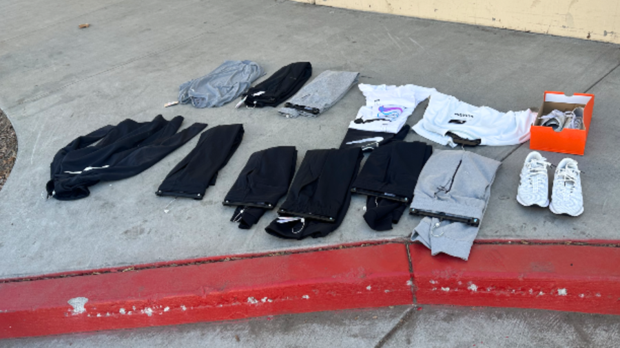 A collection of stolen merchandise was found during a statewide retail theft crackdown including clothing, shoes, fragrances and more. (California Highway Patrol)