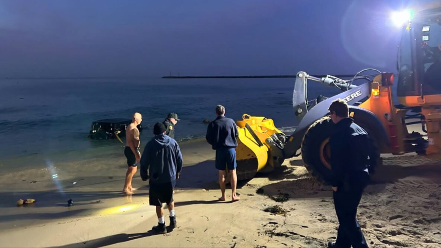 One person was rescued after emergency crews removed a Jeep Wrangler SUV found submerged in ocean waters at Corona del Mar State Beach on Dec. 14, 2024. (Newport Beach Fire Department)