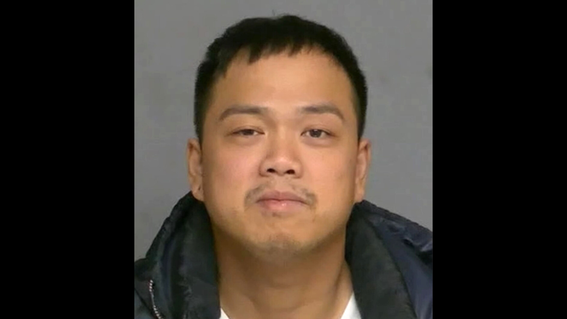 Thuan Cong Duong, 30, is seen in a booking photo from the Garden Grove Police Department.
