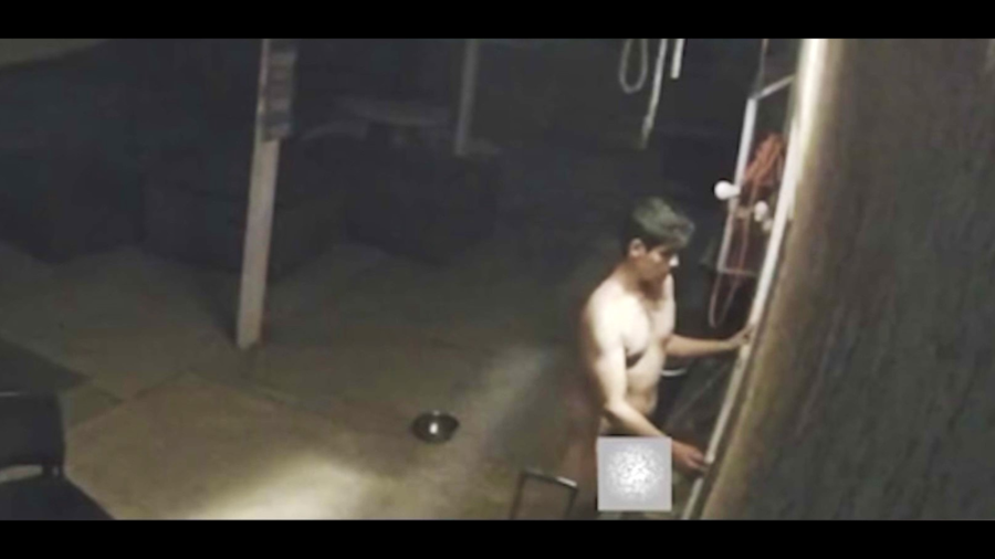 A naked male intruder is seen lurking in the backyard of a Moreno Valley home and attempting to open a door on Dec. 10, 2024. (@morenovalleymatters)