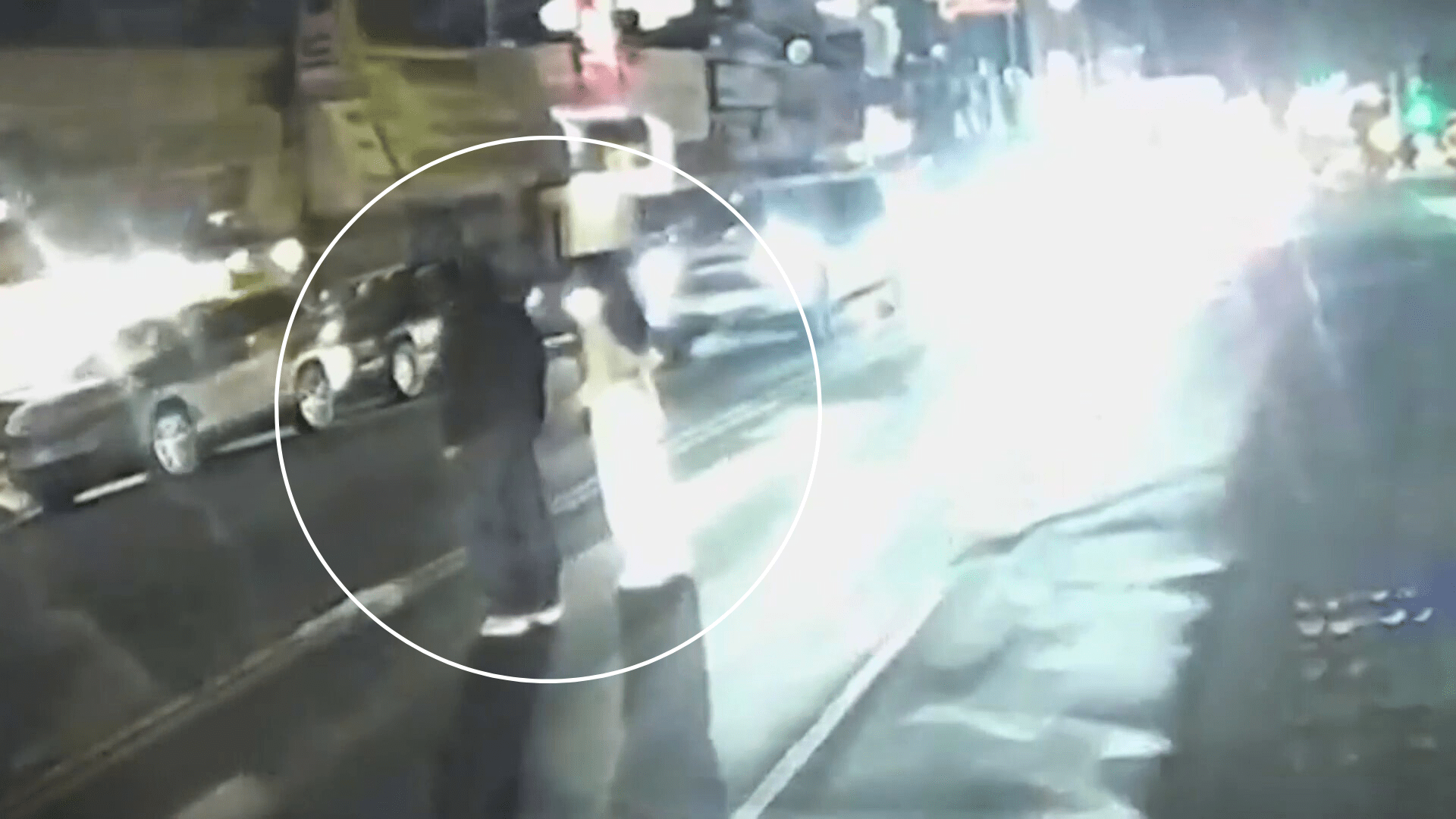 Moments before the two victims were struck by a vehicle while standing in a median lane amid traffic in Koreatown on Nov. 28, 2024. (Los Angeles Police Department)