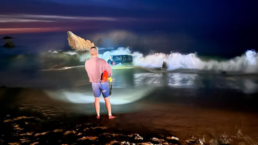 One person was rescued after emergency crews removed a Jeep Wrangler SUV found submerged in ocean waters at Corona del Mar State Beach on Dec. 14, 2024. (Newport Beach Fire Department)