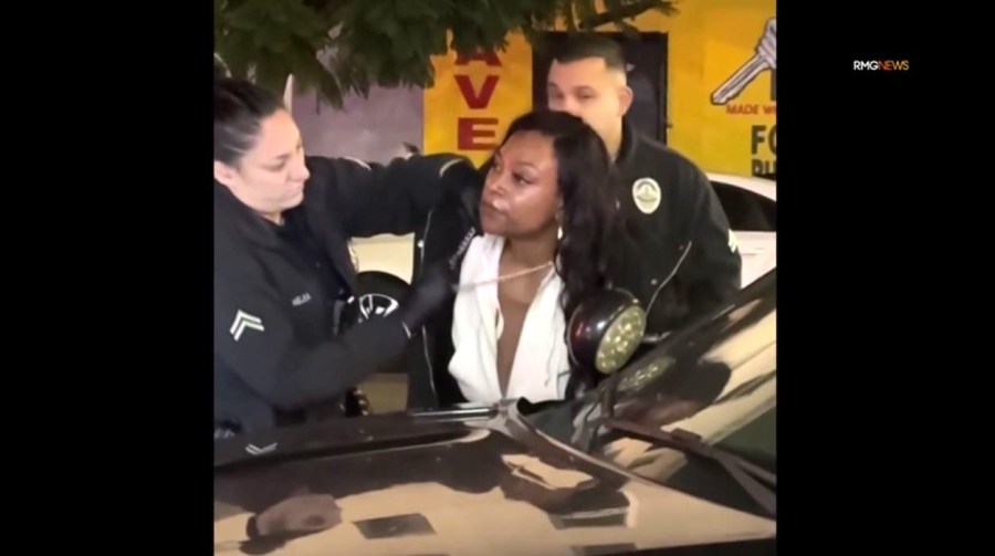A woman was arrested after she was caught on camera setting fire to a car at a Hollywood gas station on Dec. 27, 2024. (RMG)
