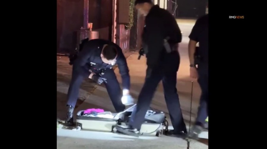 Police searched the suspect's large gray suitcase during the arrest on Dec. 27, 2024. (RMG)