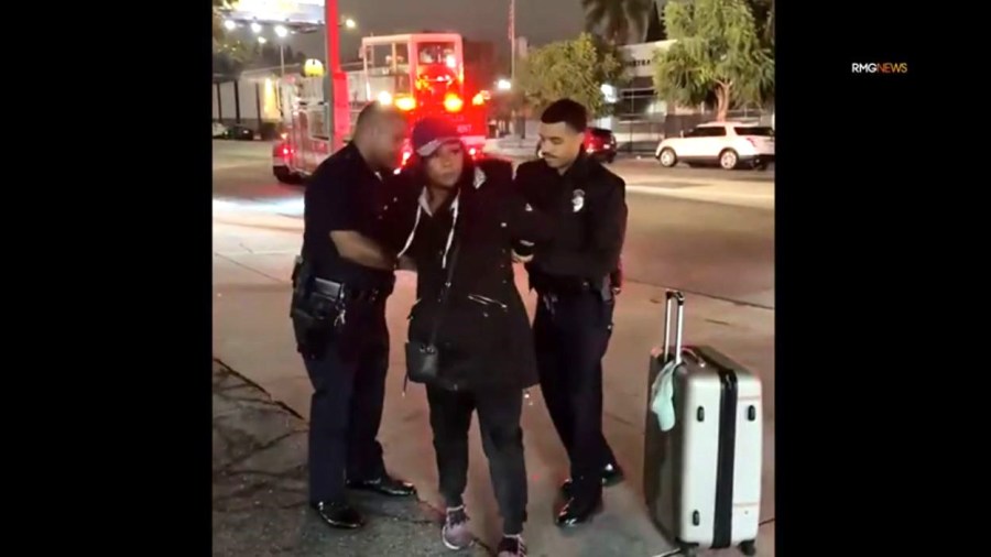 A woman was arrested after she was caught on camera setting fire to a car at a Hollywood gas station on Dec. 27, 2024. (RMG)