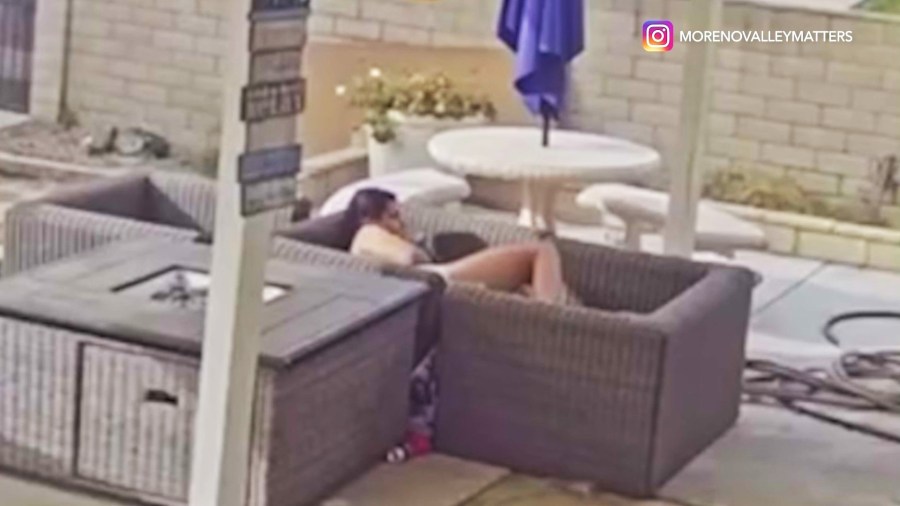 The naked intruder creates a makeshift bed using two outdoor couches and spends the rest of the light lounging in the backyard of a Moreno Valley home on Dec. 10, 2024. (@morenovalleymatters)