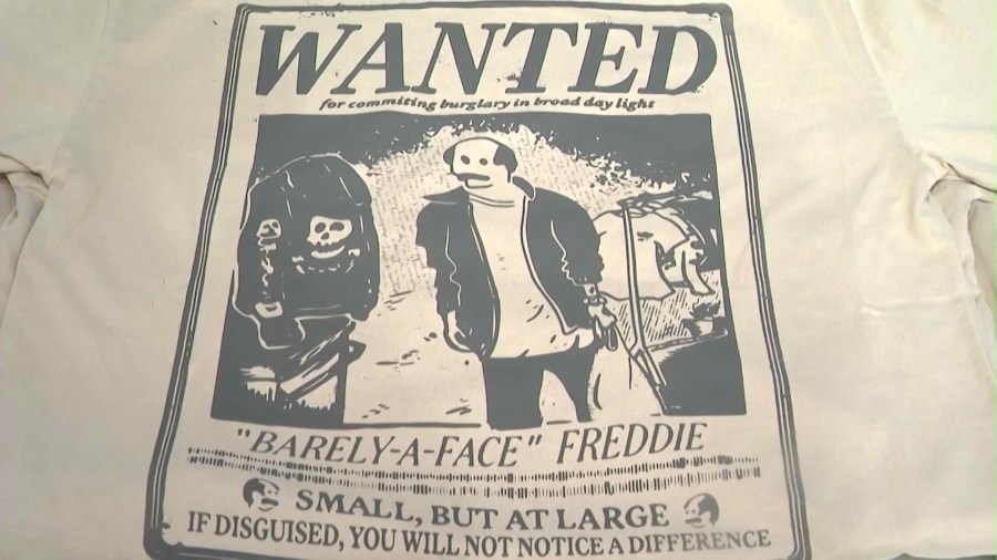 A t-shirt from Vardagen's new "Wanted" collection featuring a caricature of a male shoplifting suspect that targeted the store. (KTLA)