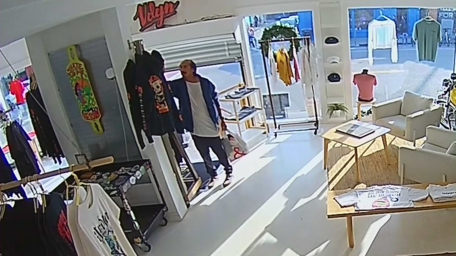 A t-shirt from Vardagen's new "Wanted" collection featuring a caricature of a male shoplifting suspect that targeted the store. (KTLA)