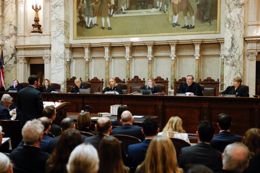 FILE - The Wisconsin Supreme Court listens to arguments from Wisconsin Assistant Attorney General Anthony D. Russomanno, representing Gov. Tony Evers, during a redistricting hearing at the state Capitol, Nov. 21, 2023, in Madison, Wis. .(Ruthie Hauge/The Capital Times via AP, Pool, File)