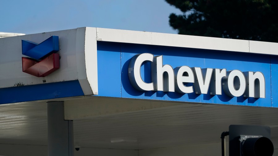 FILE - A Chevron logo is shown at a gas station in San Francisco, Oct. 23, 2023. (AP Photo/Jeff Chiu, File)