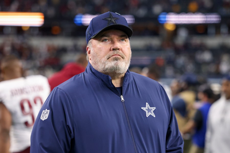 Dallas Cowboys head coach Mike McCarthy walks on the field following an NFL football game against the Washington Commanders, Sunday, Jan. 5, 2025, in Arlington, Texas. The Commanders won 23-19. (AP Photo/Gareth Patterson)