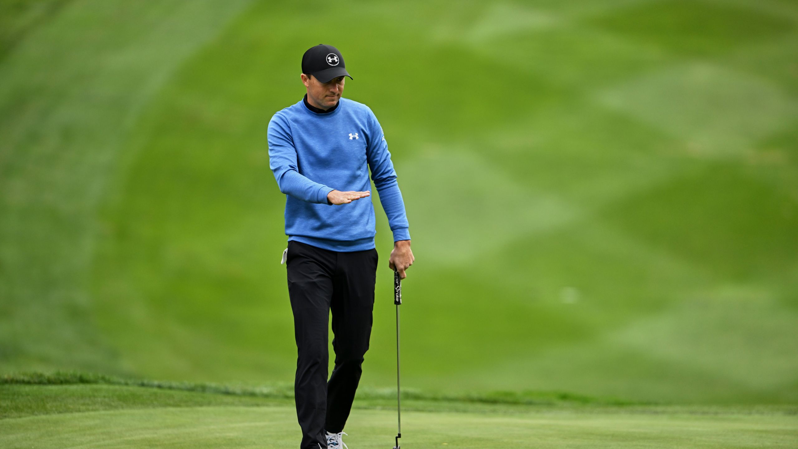 Jordan Spieth watches his putt on the 16th hole at Spyglass Hill Golf Course during the first round of the AT&T Pebble Beach Pro-Am golf tournament, Thursday, Jan. 30, 2025, in Pebble Beach, Calif. (AP Photo/Nic Coury)