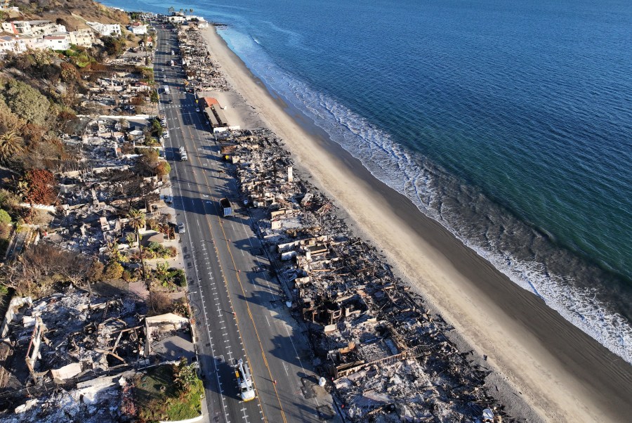 MALIBU, CALIFORNIA - JANUARY 16: An aerial view of a beachside homes destroyed in the Palisades Fire along Pacific Coast Highway as wildfires cause damage and loss through the LA region on January 16, 2025 in Malibu, California. Multiple wildfires which were fueled by intense Santa Ana Winds have burned across Los Angeles County leaving at least 27 dead with over 180,000 people having been under evacuation orders. Over 12,000 structures have been burned in the Palisades and Eaton Fires. (Photo by Mario Tama/Getty Images)