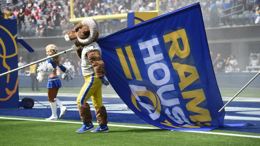 Rams mascot Rampage carries the Rams House flag