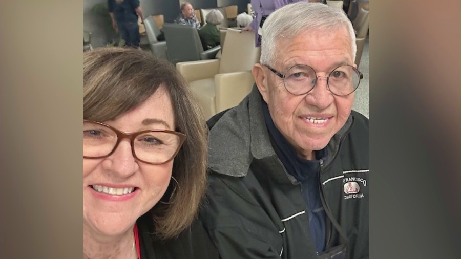 Fritz Mendoza is pictured with his wife in a family photo.