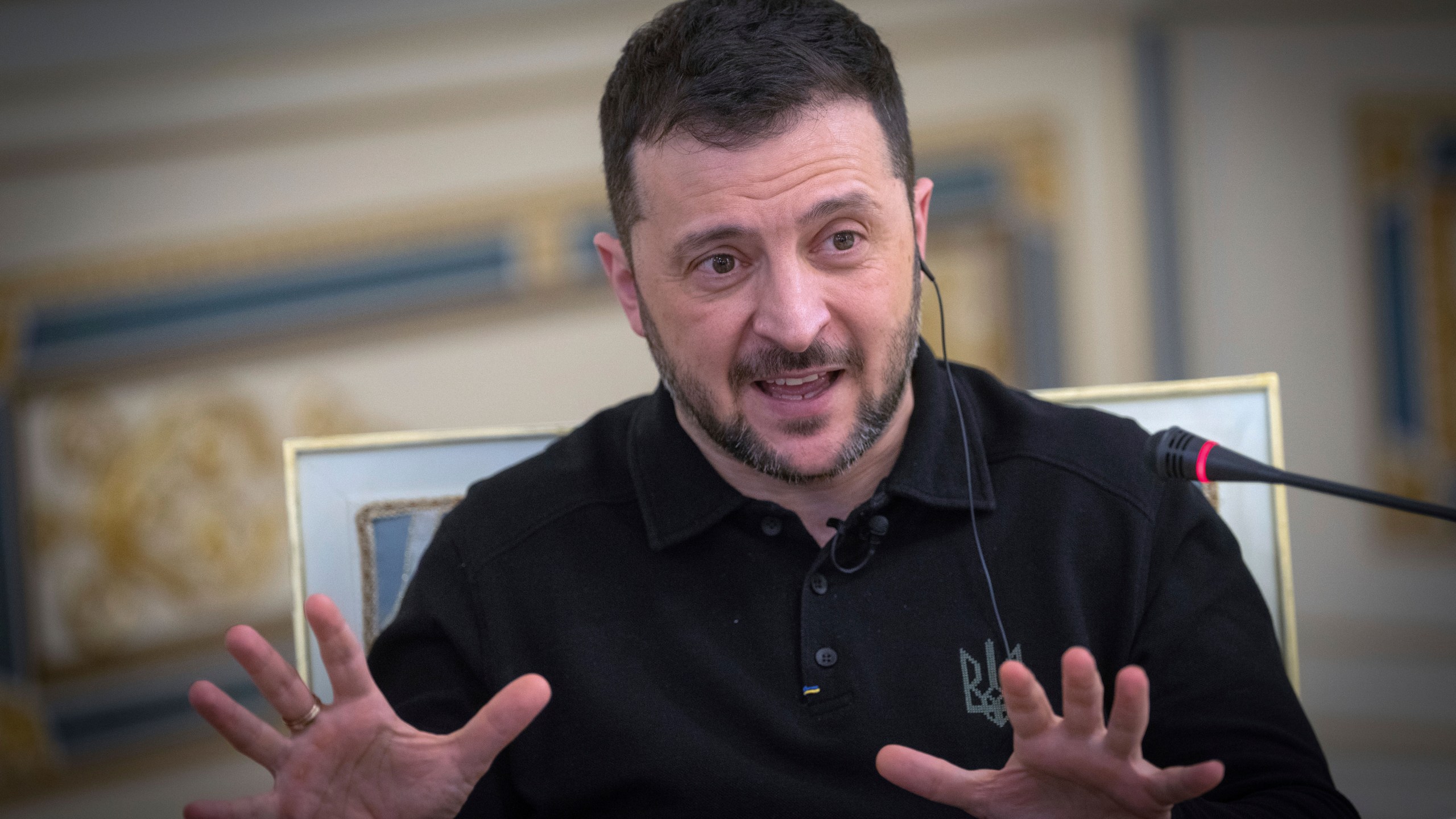 Ukrainian President Volodymyr Zelenskyy gestures as he speaks during an interview with The Associated Press in Kyiv, Ukraine, Saturday, Feb. 1, 2025. (AP Photo/Efrem Lukatsky)