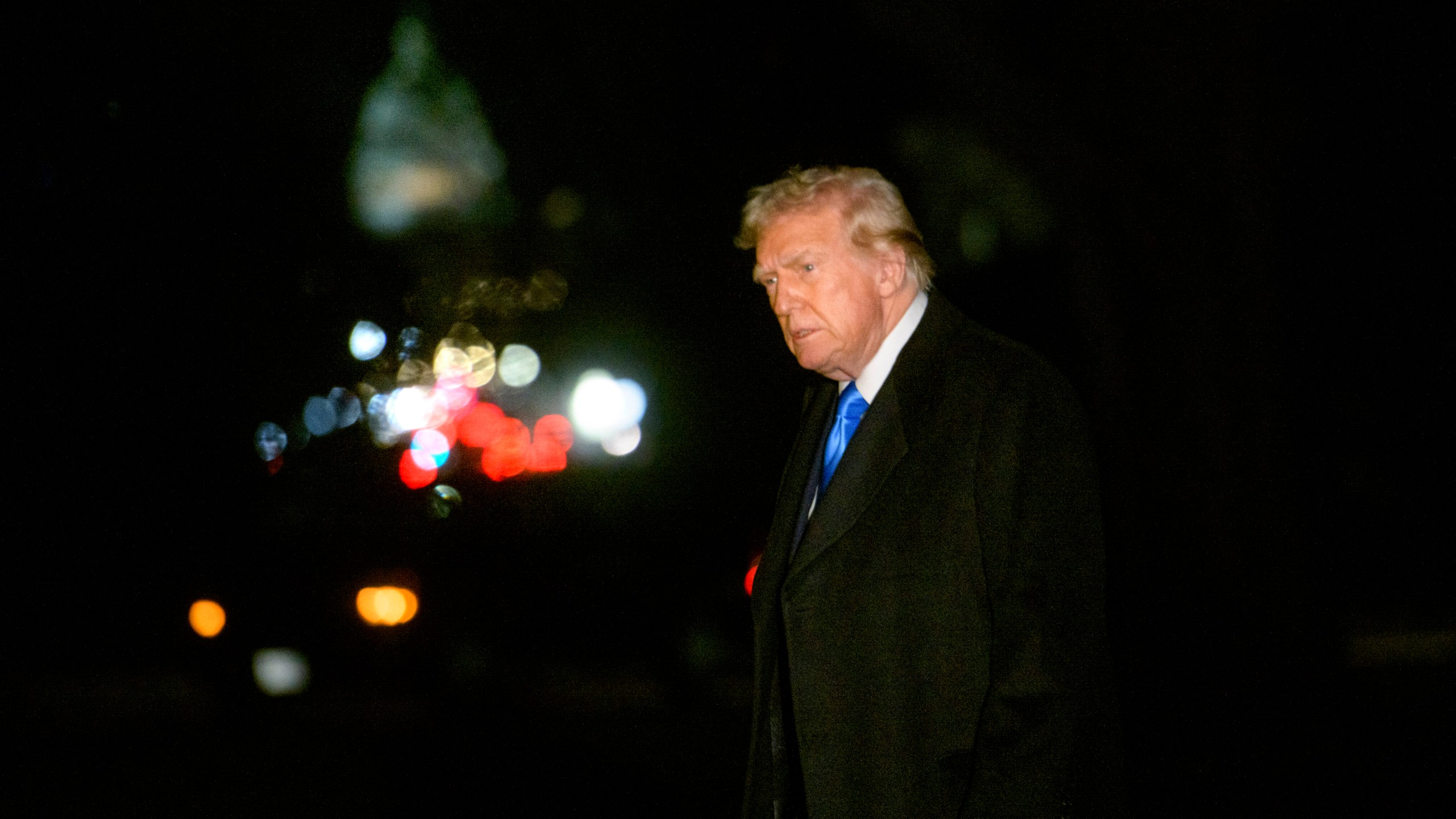 President Donald Trump walks from Marine One upon arrival on the South Lawn of the White House in Washington, Sunday, Feb. 2, 2025. (AP Photo/Rod Lamkey, Jr.)