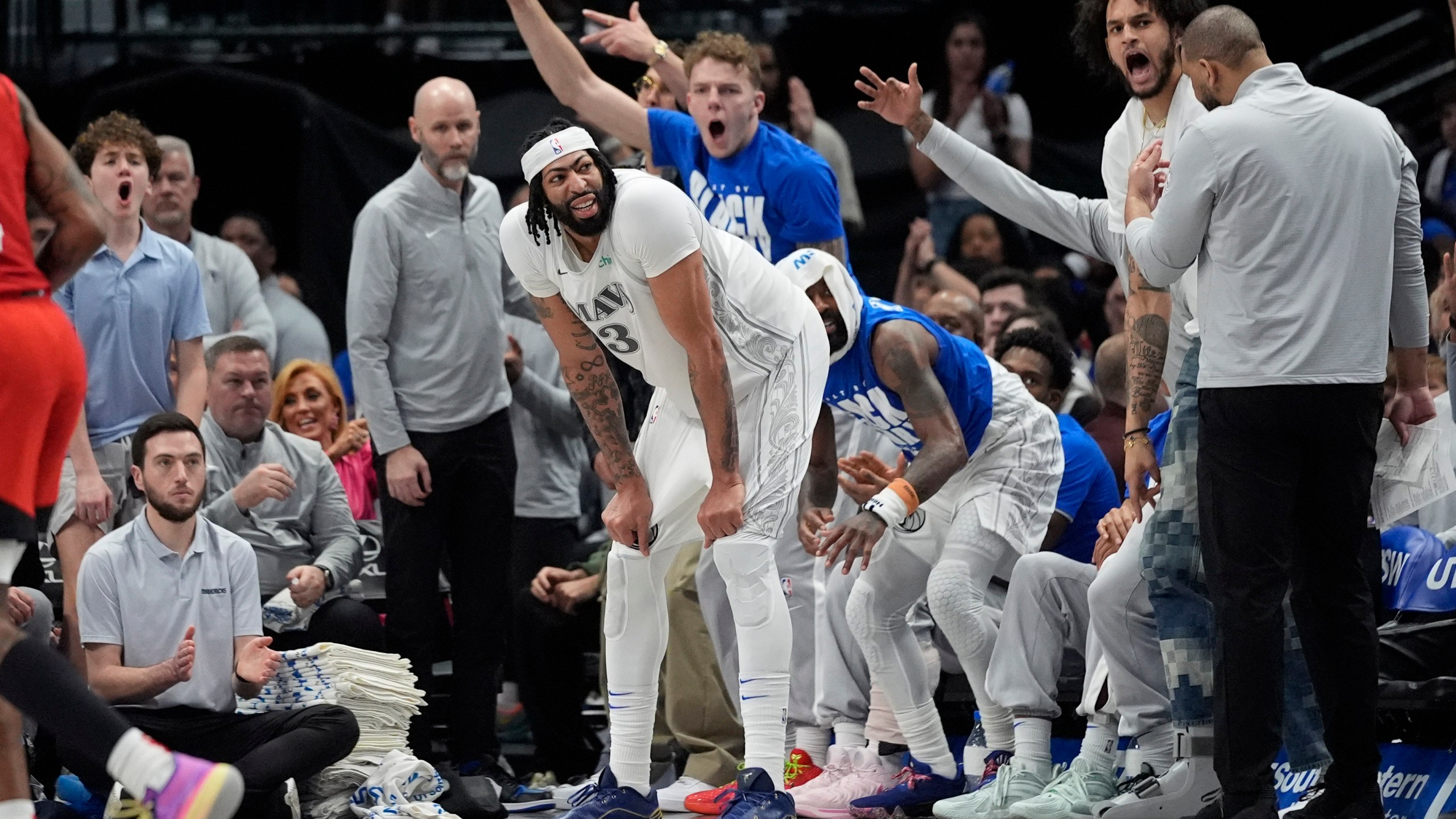 Dallas Mavericks forward Anthony Davis (3) waits for a time out in front of the bench during the third quarter of an NBA basketball game against the Houston Rockets, Saturday, Feb. 8, 2025, in Dallas. (AP Photo/LM Otero)