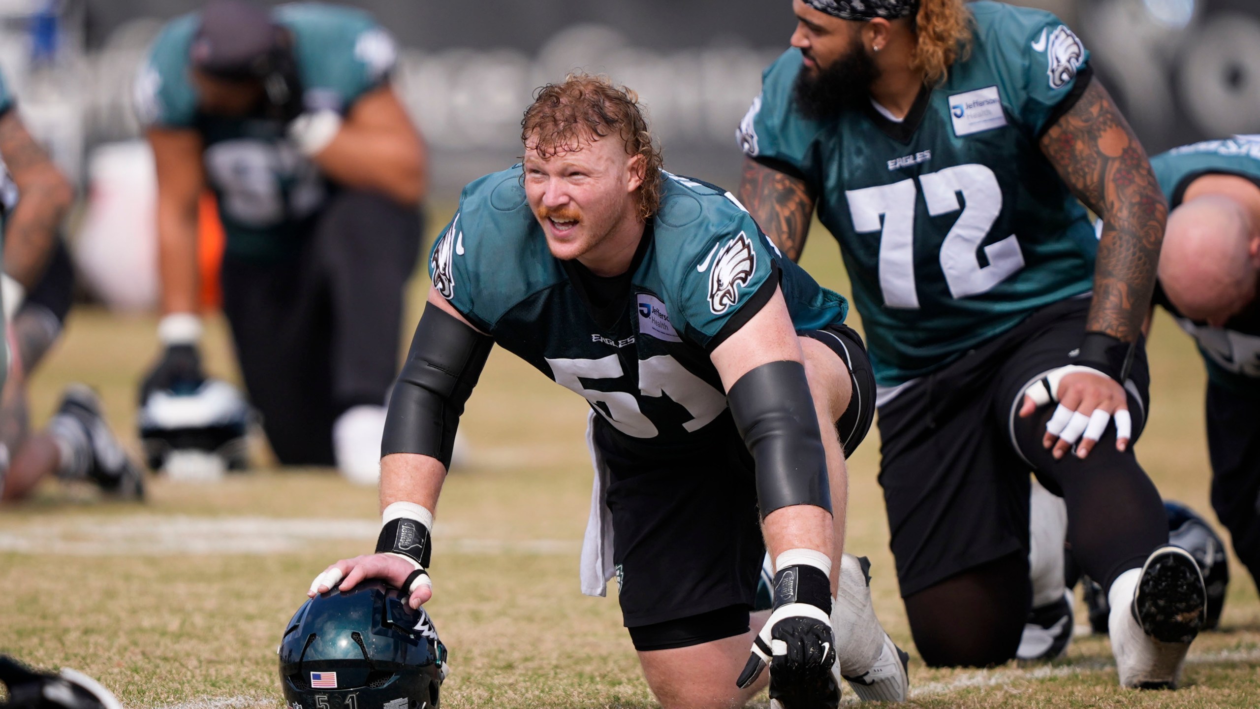 Philadelphia Eagles center Cam Jurgens (51) warms up during an NFL football practice Friday, Feb. 7, 2025, in New Orleans, ahead of Super Bowl 59 against the Kansas City Chiefs. (AP Photo/Gerald Herbert)