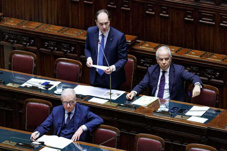 Cabinet Minister Luca Ciriani, left back, speaks during Question Time in the Chamber of Deputies, in Rome, Wednesday, Feb. 12, 2025. (Roberto Monaldo/LaPresse via AP)