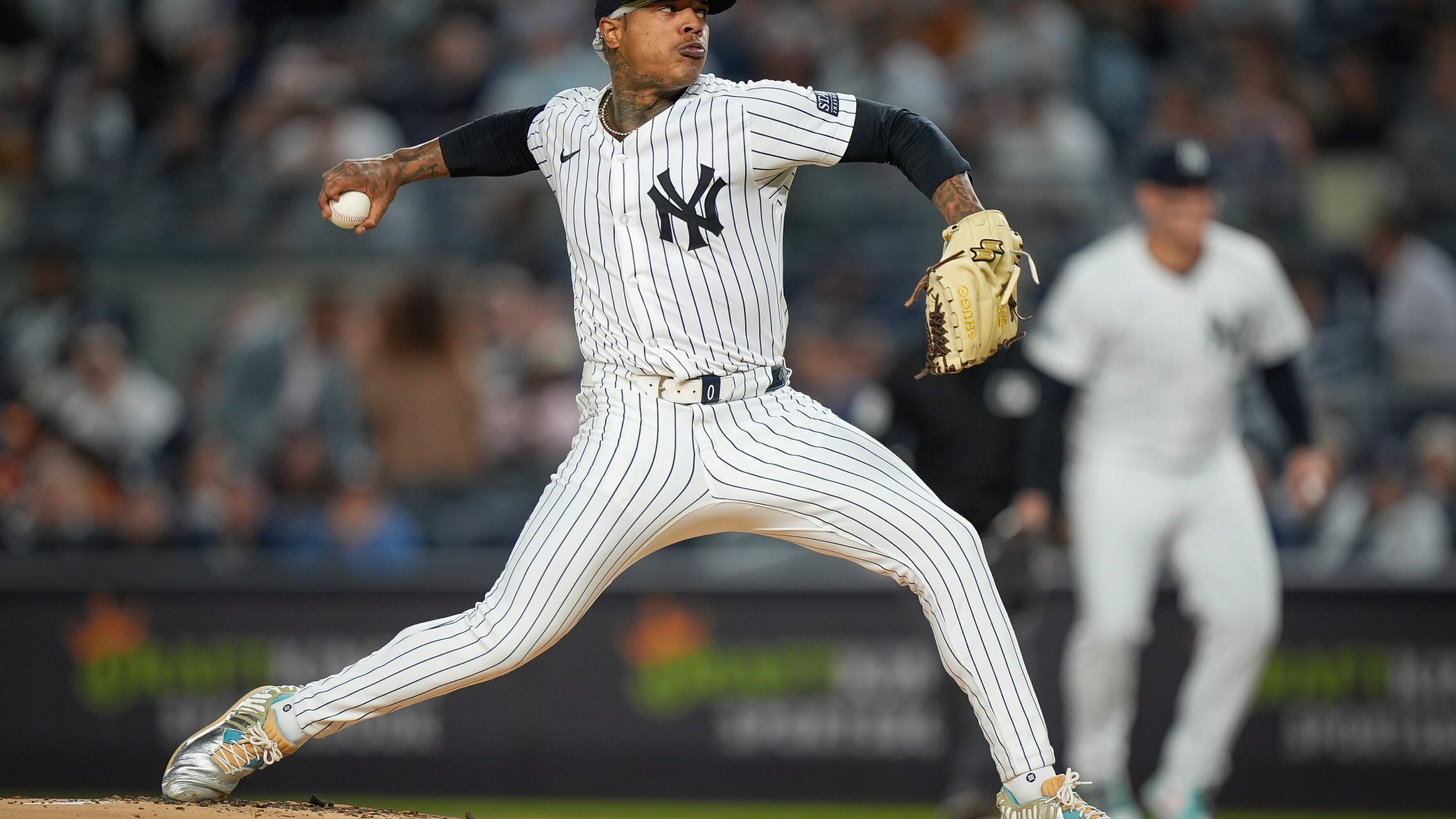 FILE - New York Yankees pitcher Marcus Stroman delivers during the first inning of a baseball game against the Baltimore Orioles, Sept. 25, 2024, in New York. (AP Photo/Bryan Woolston, File)