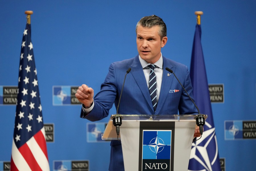 United States Secretary of Defense Pete Hegseth speaks during a media conference after a meeting of NATO defense ministers at NATO headquarters in Brussels, Thursday, Feb. 13, 2025. (AP Photo/Virginia Mayo)
