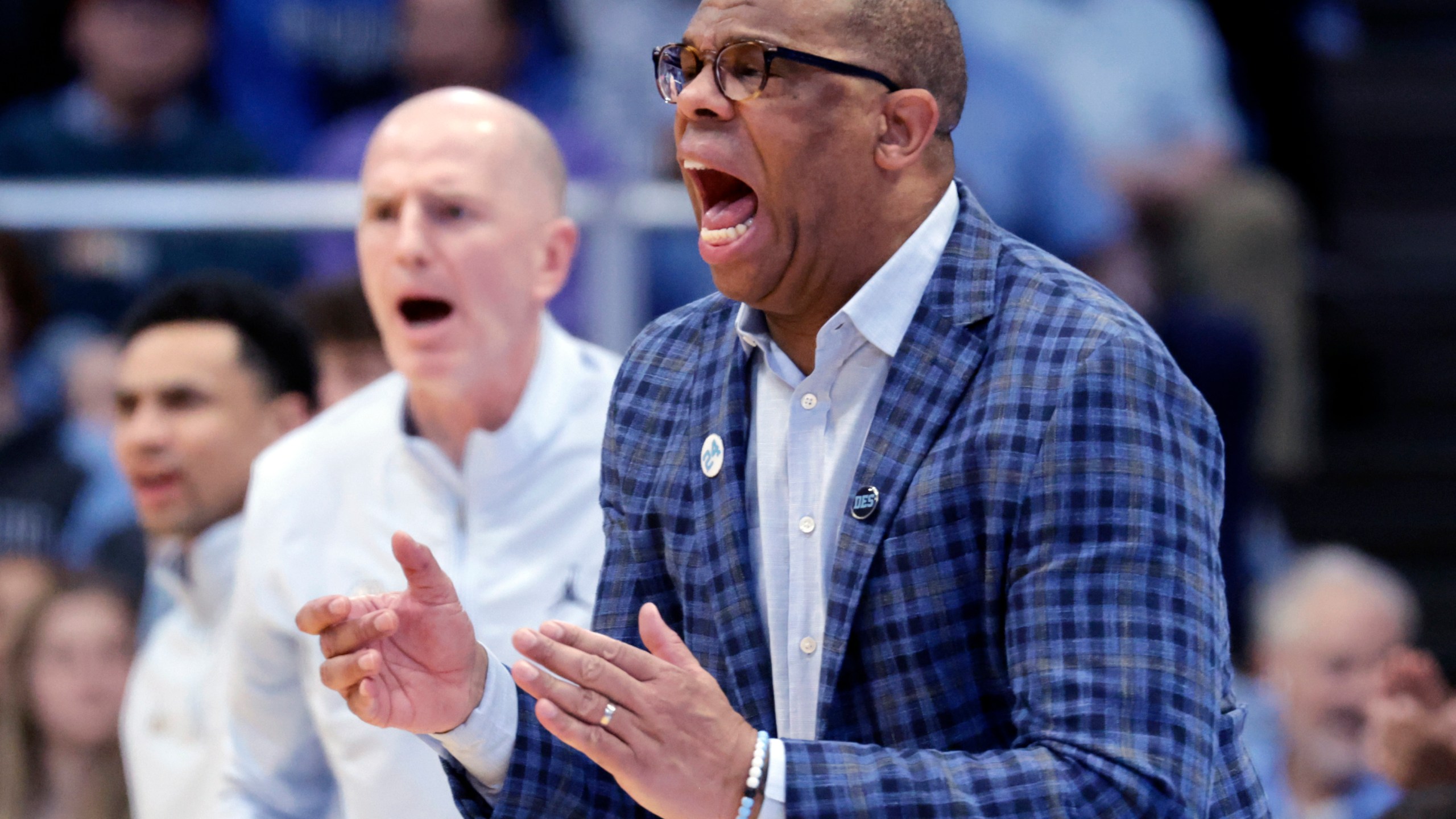 North Carolina head coach Hubert Davis directs the team against Virginia during the second half of an NCAA college basketball game Saturday, Feb. 22, 2025, in Chapel Hill, N.C. (AP Photo/Chris Seward)
