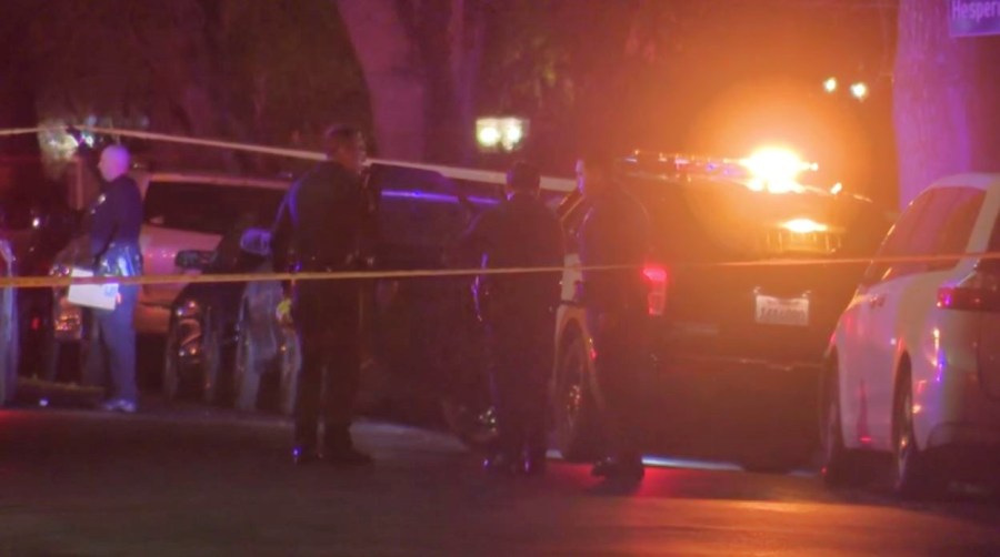 A homicide investigation is underway after a 54-year-old woman was shot and killed in an Encino neighborhood on Feb. 5, 2025. (KTLA)