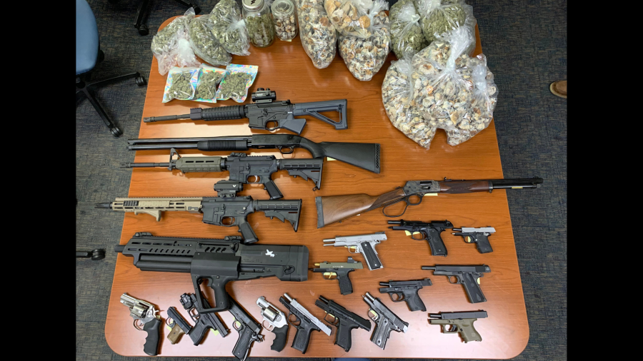 A collection of firearms, psilocybin mushrooms and more were found after four suspects were arrested in connection with a large-scale illegal marijuana growing operation found in homes across Ventura and Los Angeles counties. (Ventura County Sheriff’s Office)