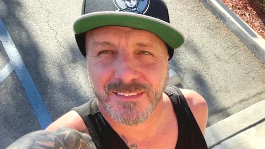 The victim, Josh Nichols, 44, is seen in a family photo.