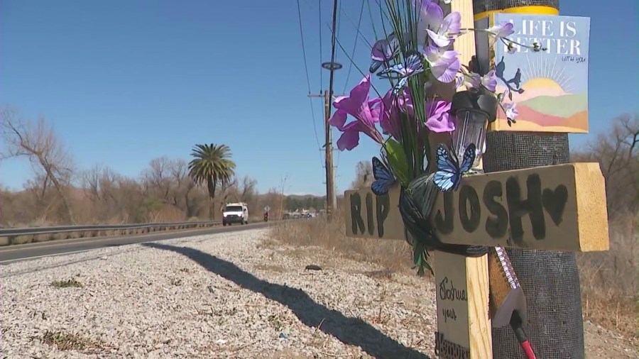 A makeshift memorial honoring Josh Nichols can be seen along Riverside Drive in Lake Elsinore. (KTLA)