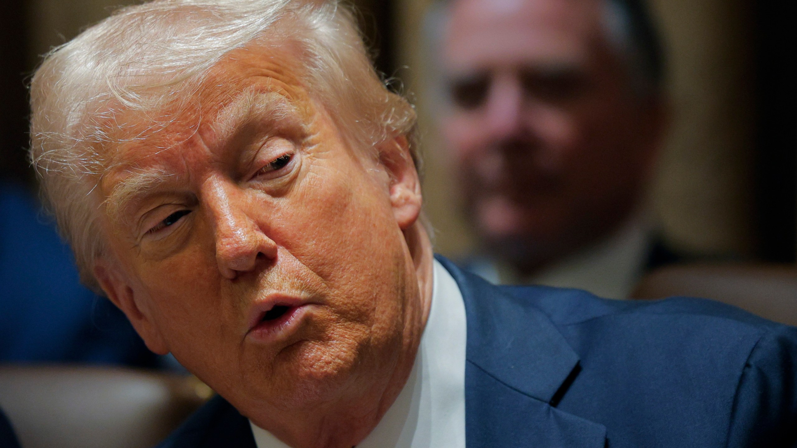President Donald Trump speaks during a Cabinet meeting at the White House in Washington, Wednesday, Feb. 26, 2025. (Pool via AP)