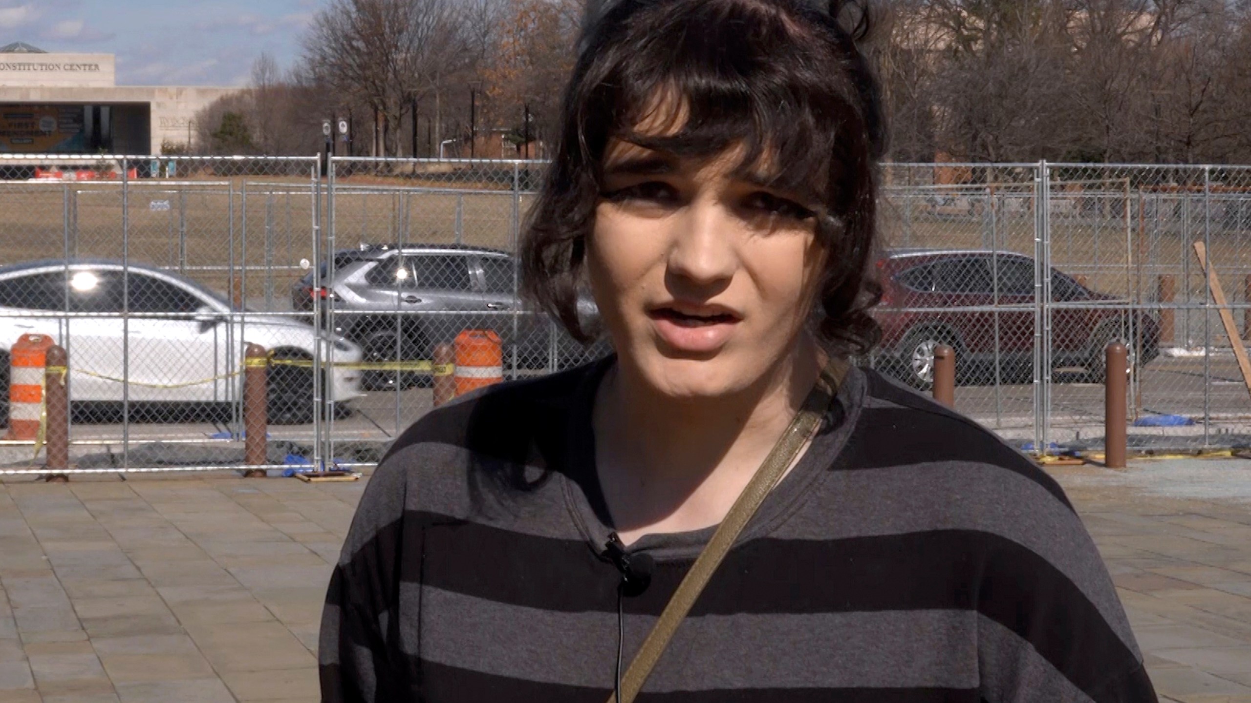 Cassandra Piper, an instrumentalist, speaks about President Donald Trump in Philadelphia, Wednesday, Feb. 26, 2025. (AP Photo/Tassanee Vejpongsa)