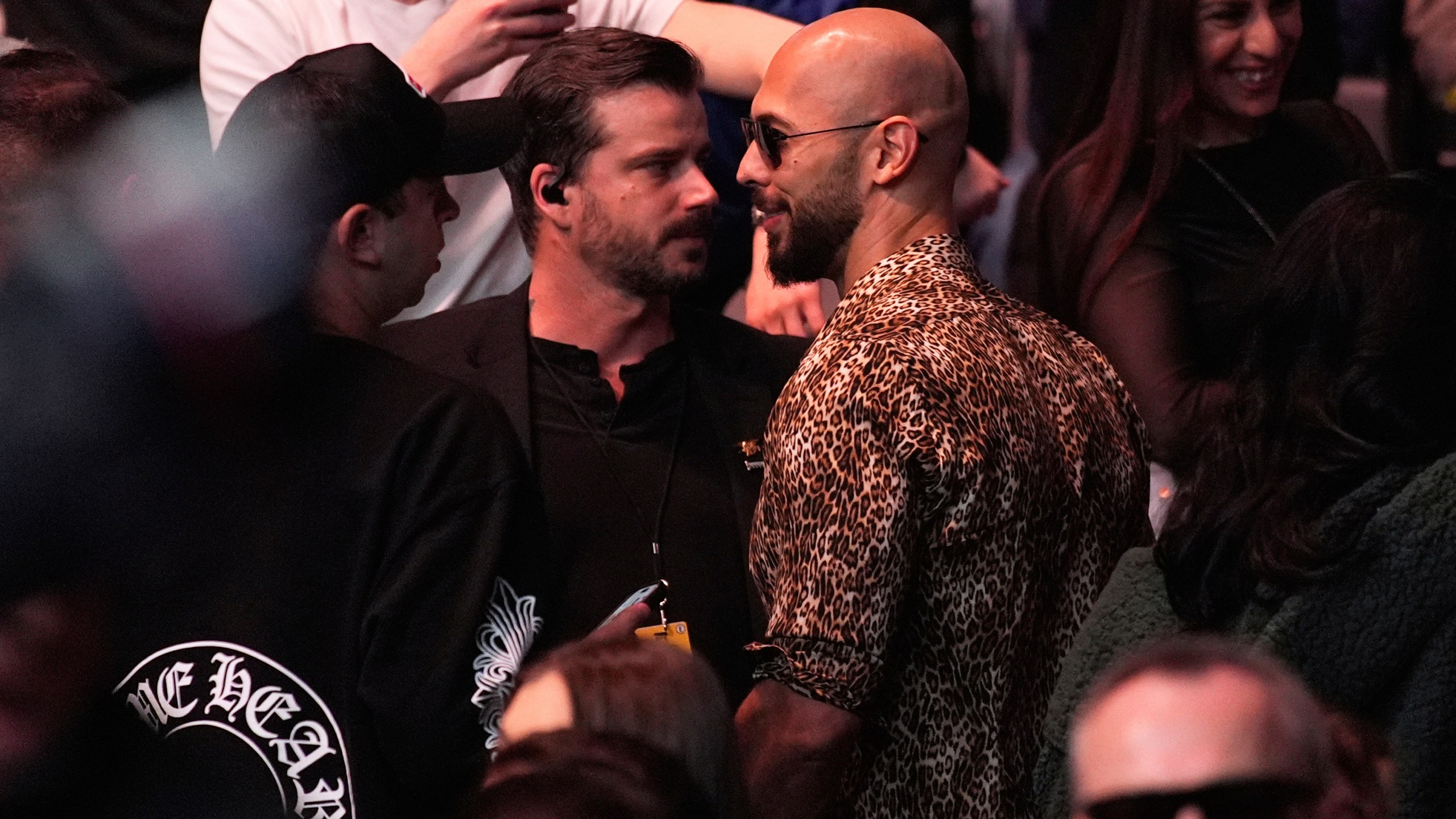 Andrew Tate attends a UFC 313 mixed martial arts event bout Saturday, March 8, 2025, in Las Vegas. (AP Photo/John Locher)