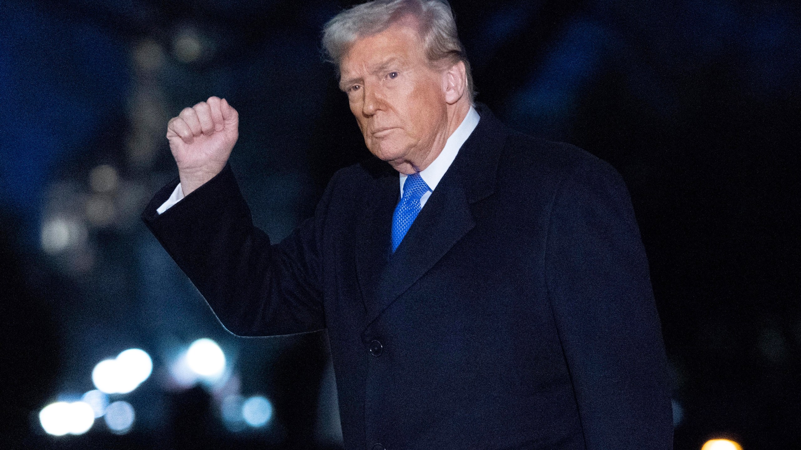 President Donald Trump waves to the media as he walks on South Lawn of the White House, in Washington, Sunday, March 9, 2025. (AP Photo/Jose Luis Magana)